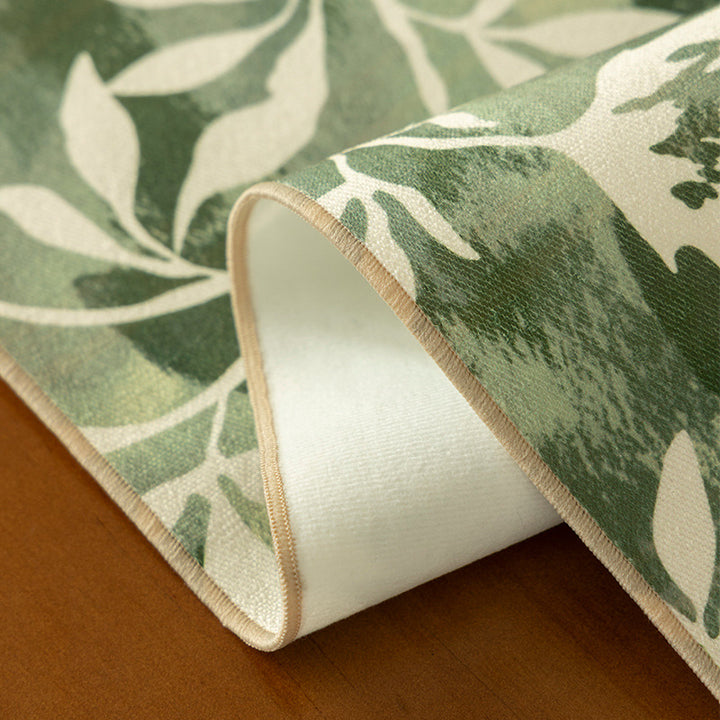 Geformter Dekor-Teppich mit gewellter Kante und floraler Aquarell-Optik