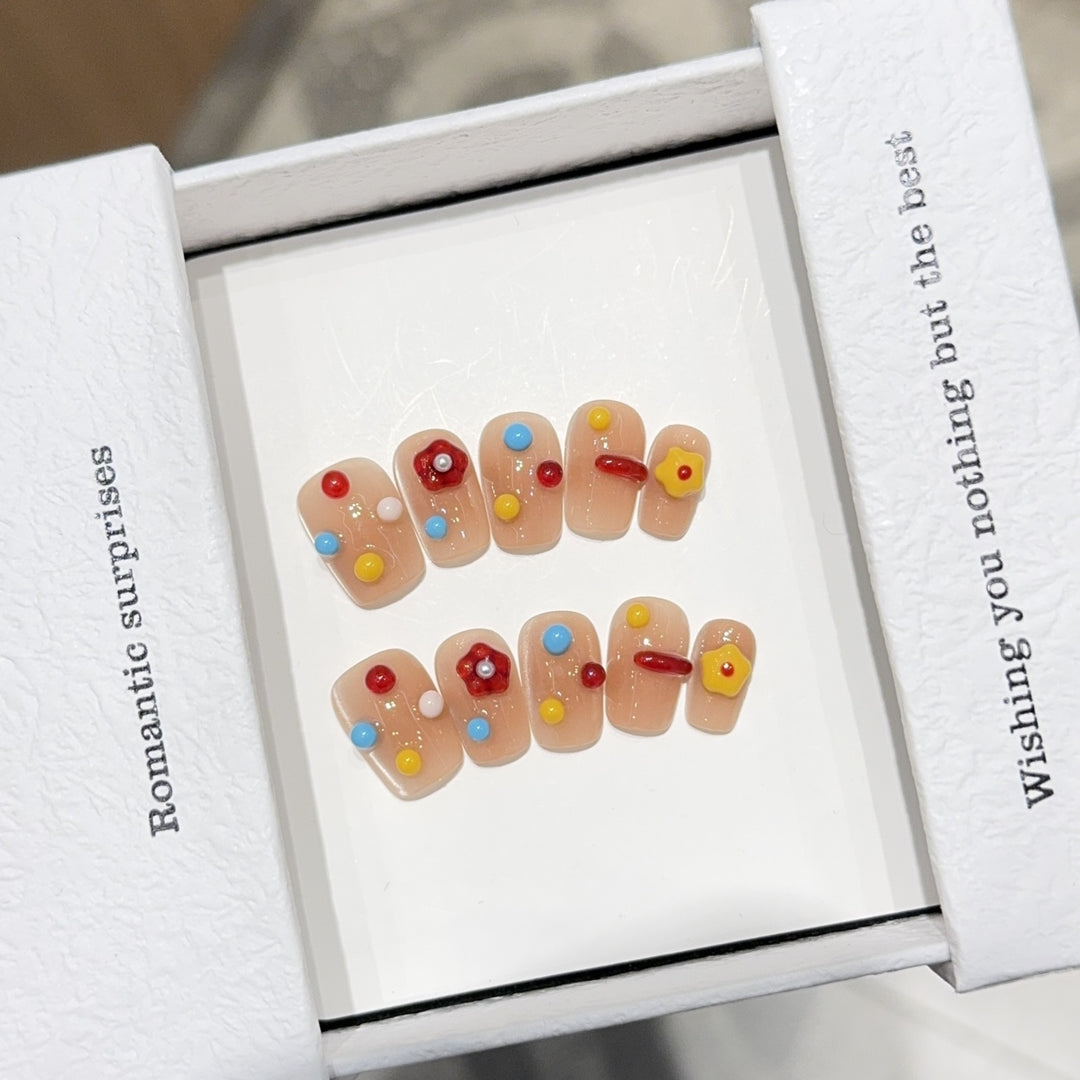 Kunstnägel mit Bunten 3D-Akzenten Karnz