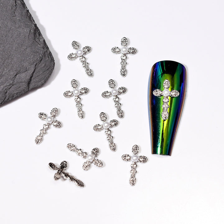 Kreuzförmige Nagelkunst-Verzierungen