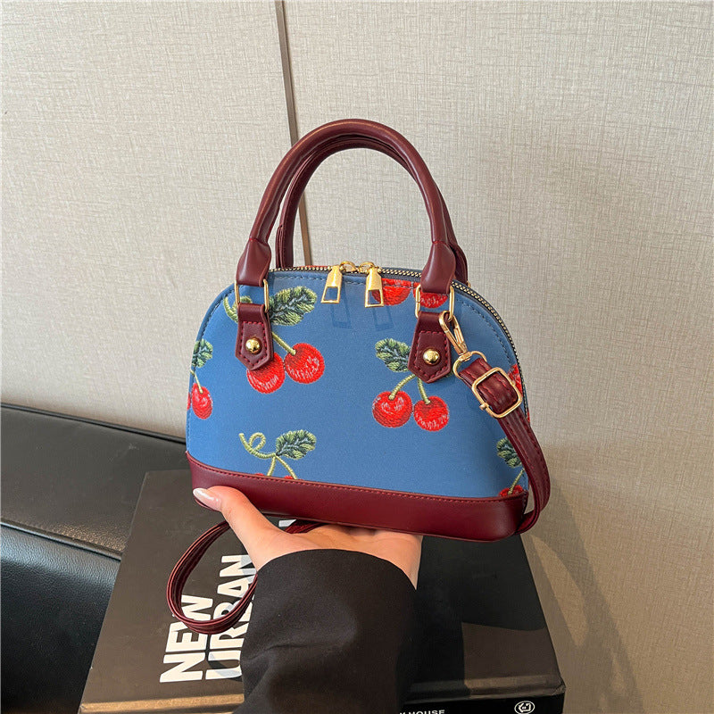 WoBestickte Kirschmuster-Handtasche Karnz