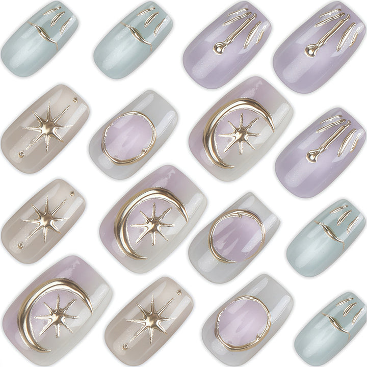 Künstlerisches Press-On Nagelset mit dekorativen himmlischen Designs Karnz