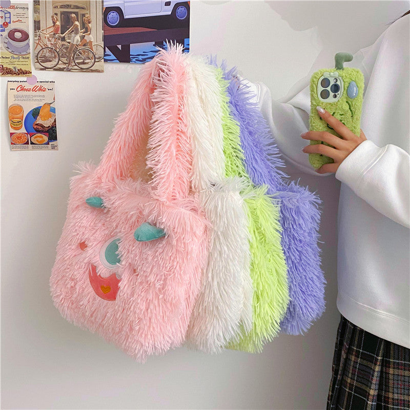 Verspielte Monster Plüschtasche