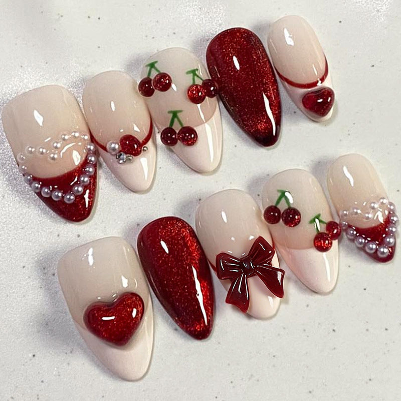 Dekoratives Press-On Nagelkunst-Set mit Herz- und Schleifenakzenten Karnz