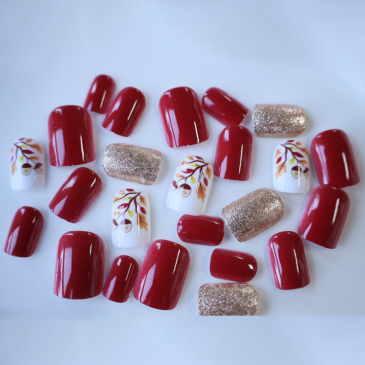 Künstlerische herbstliche Press-On Nagelkunst Karnz