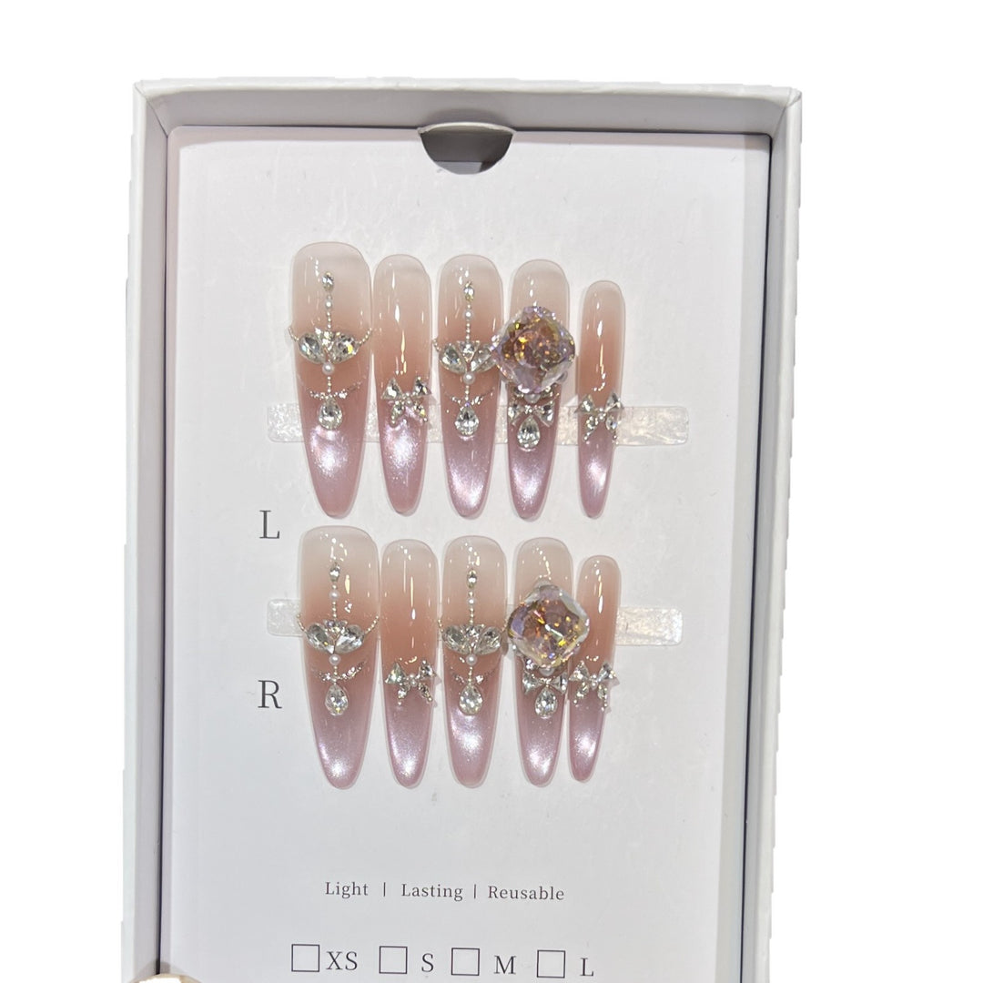 Dekorative, mit Strass veredelte Stiletto Press-On Nägel Karnz