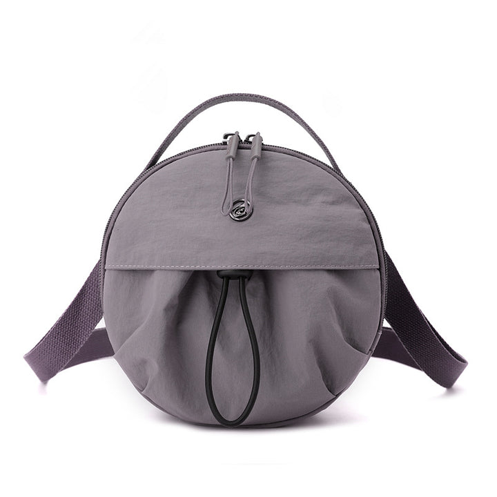 Runde Crossbody-Tasche Karnz