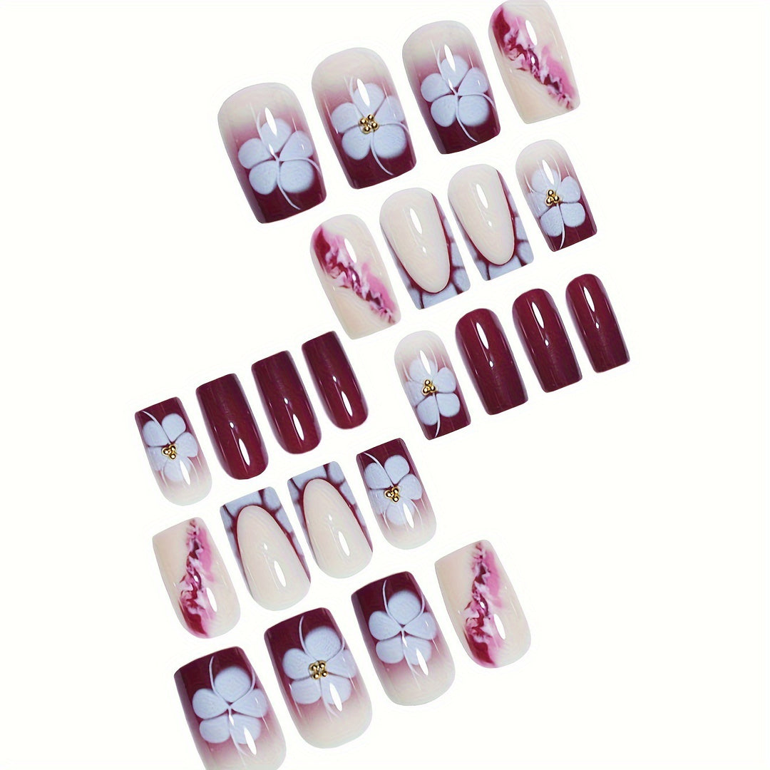 Künstlerische Gel-Nagelverlängerungen mit floralem Design Karnz