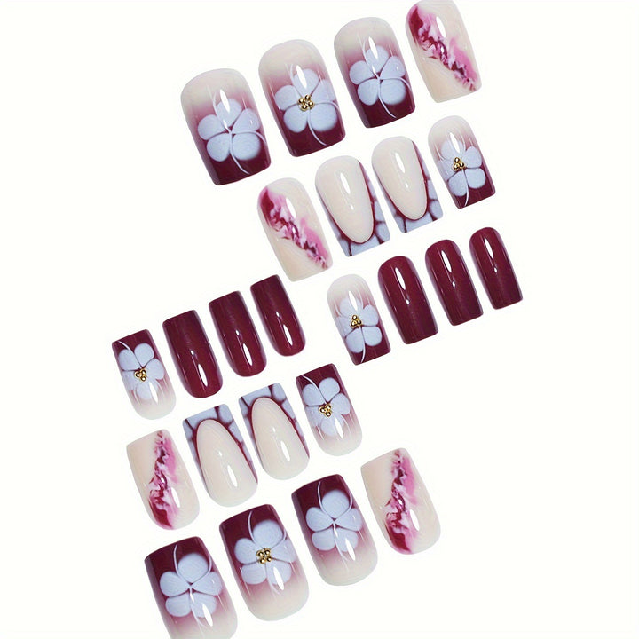 Künstlerische Gel-Nagelverlängerungen mit floralem Design Karnz