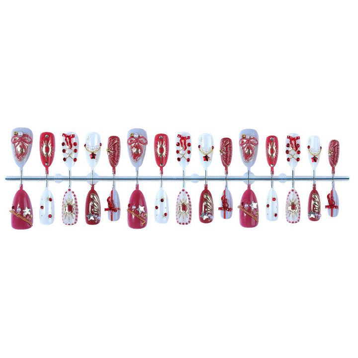 Kunstnagelset mit festlichen Weihnachts- und Glamour-Designs Karnz