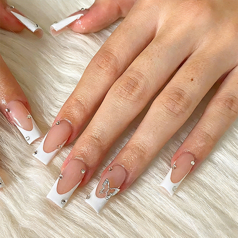 Kunstvolle Nagelset mit Schmetterlingsverzierung Karnz