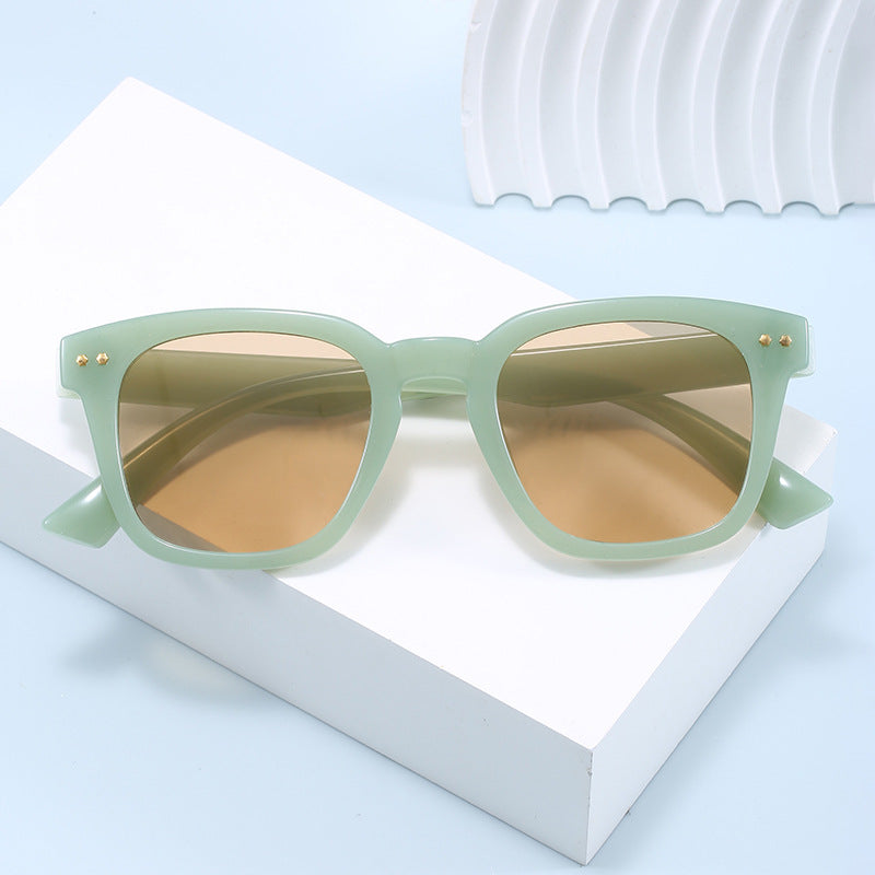 Damen Quadratische Sonnenbrille mit modernem transparentem Rahmen und UV-Schutz Karnz