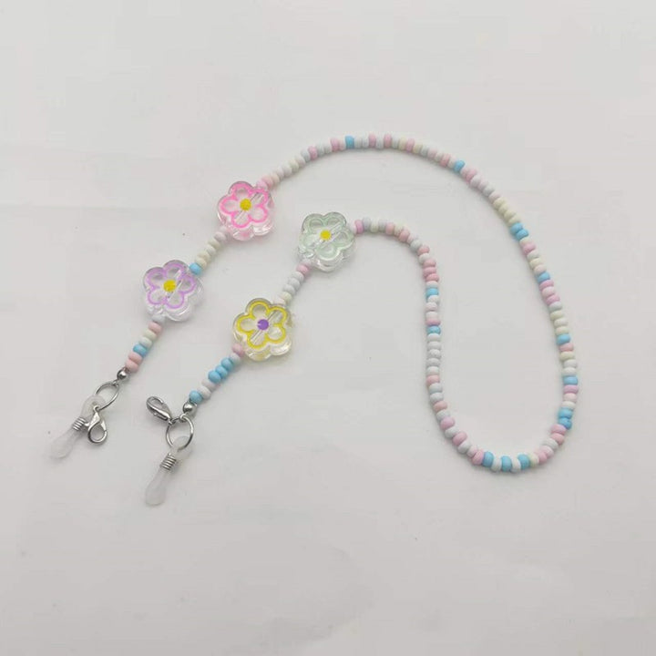 Verspielte Brillenhalterkette mit Blumenanhängern Karnz