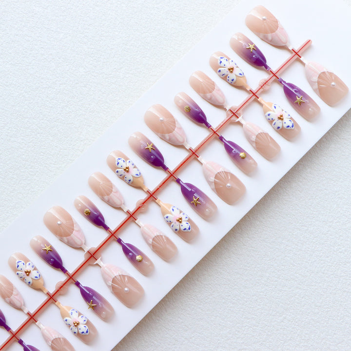 Dekoratives Press-On Nagelkunst Set mit floralen und ozeanischen Themen Karnz