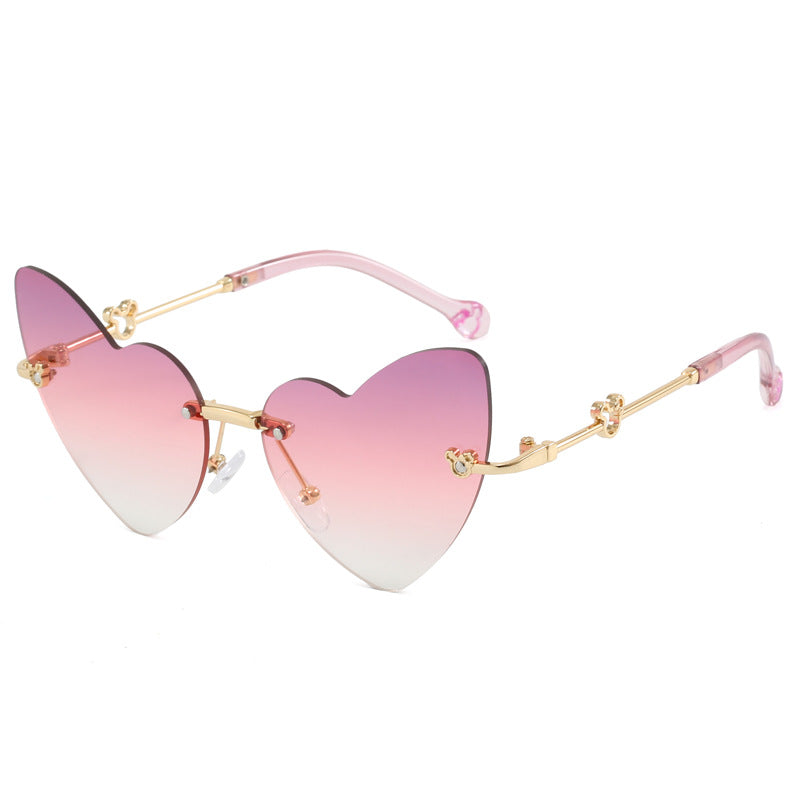 Damen Herzförmige Sonnenbrille mit verziertem Rahmen Karnz