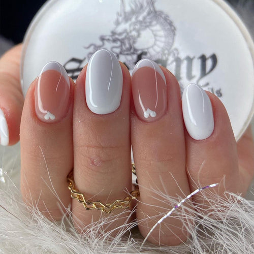 Kunstnagelset mit kreativem Herzmotiv Karnz