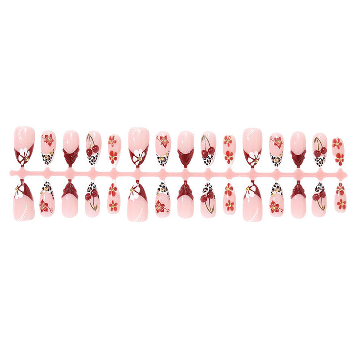 Kunstnagelset mit floralen 3D-Designs und eleganten Akzenten Karnz