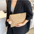 Damen Clutch aus geflochtenem Naturmaterial Karnz
