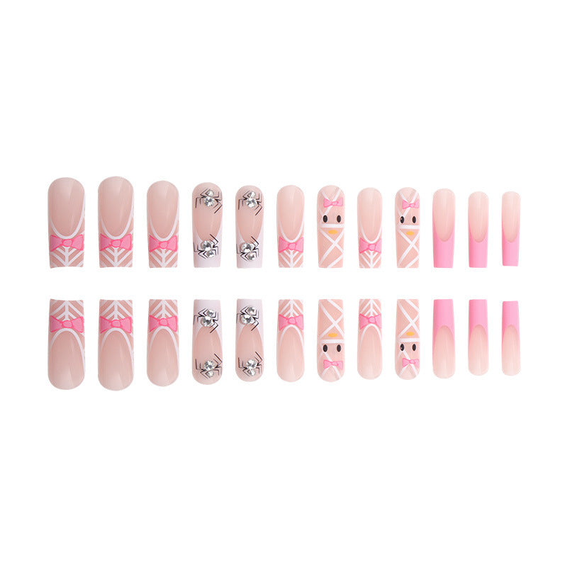 Künstlerische Press-On-Nagelerweiterungen mit Spinnen- und Schleifen-Design Karnz