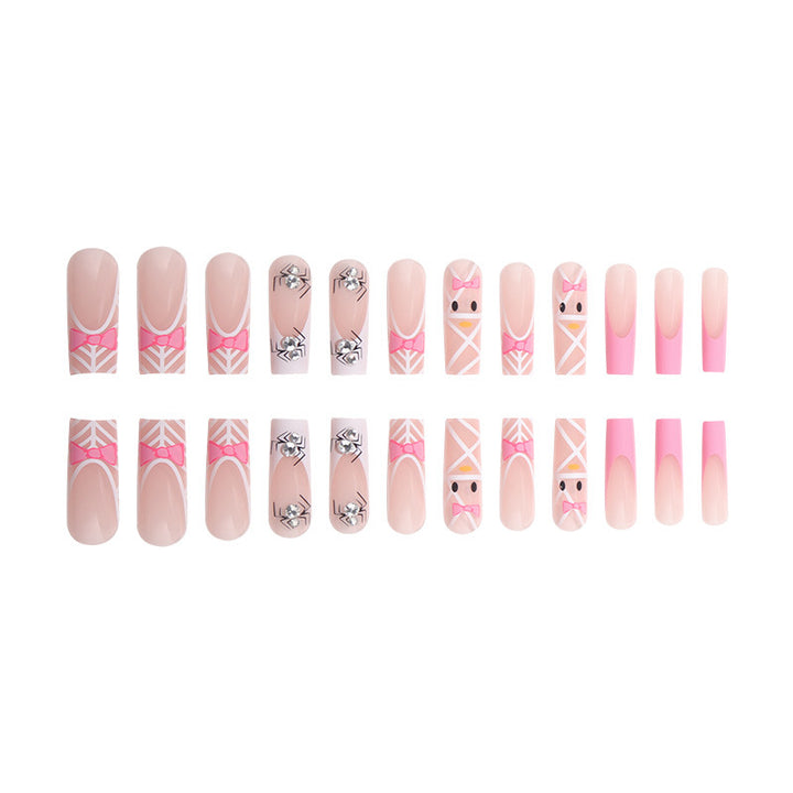 Künstlerische Press-On-Nagelerweiterungen mit Spinnen- und Schleifen-Design Karnz