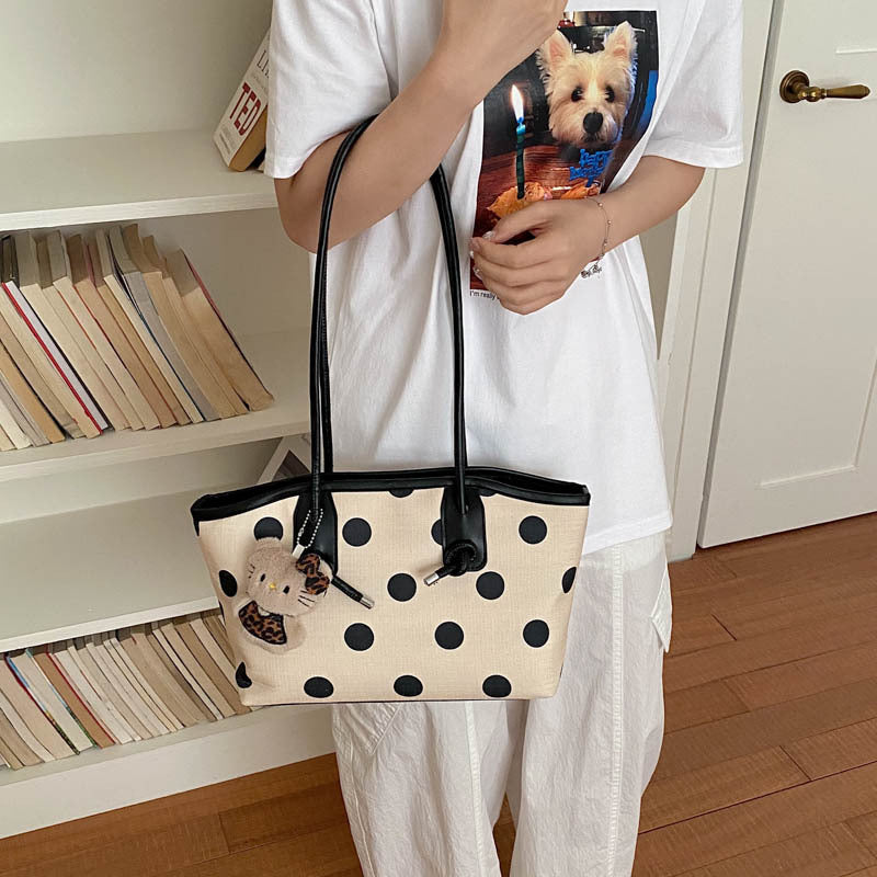 Punktierte Handtasche