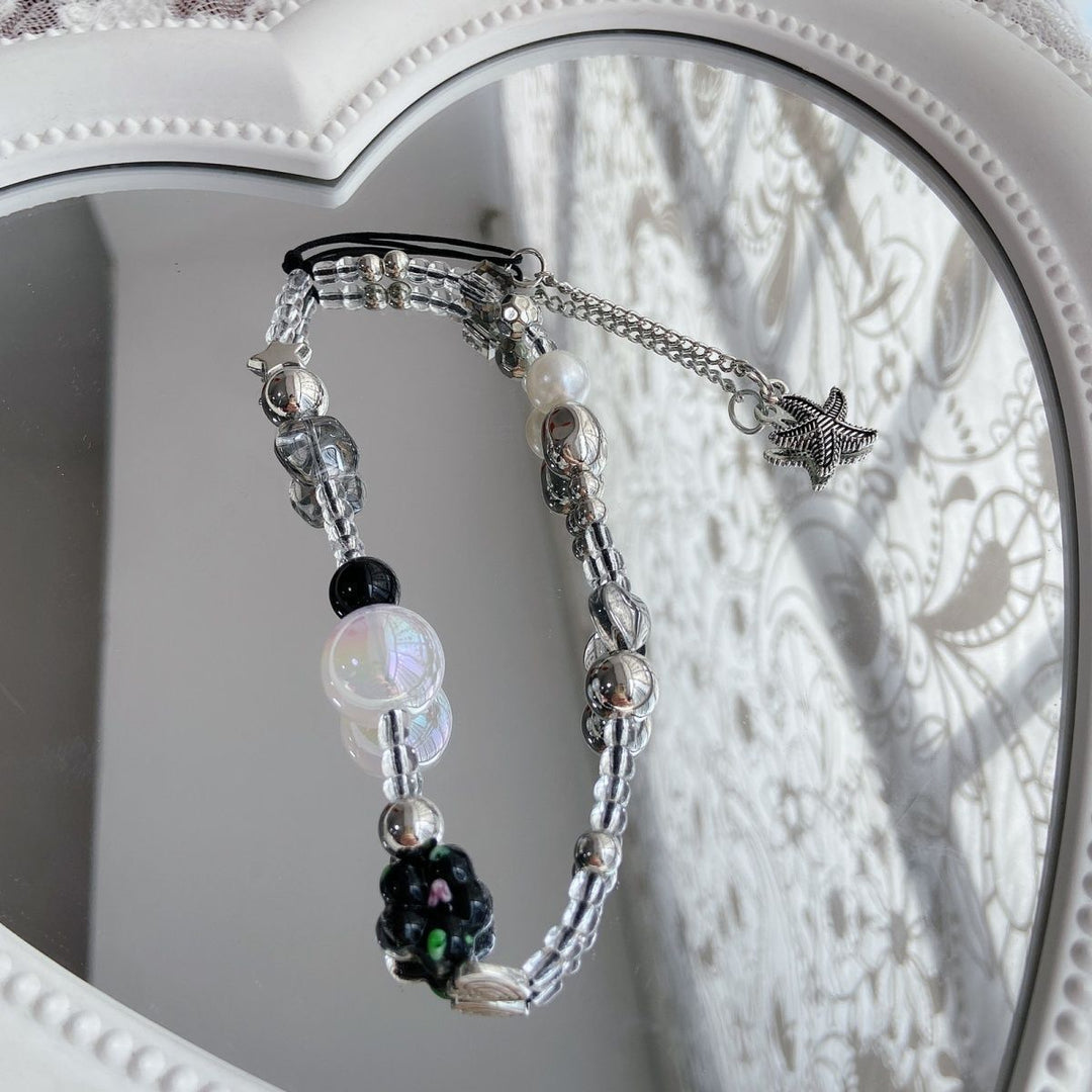 Eleganter Perlen-Charm-Brillenhalter Karnz