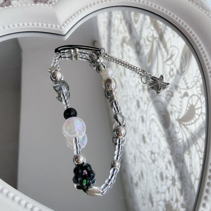 Eleganter Perlen-Charm-Brillenhalter Karnz