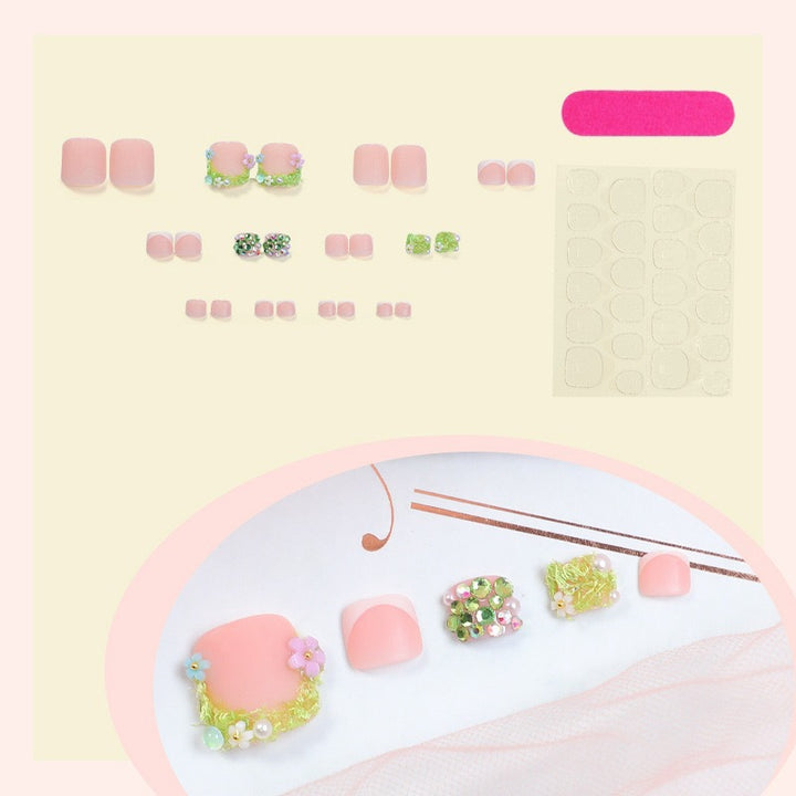 Kunstnagelset mit floralen 3D-Details und Glitzerverzierungen Karnz