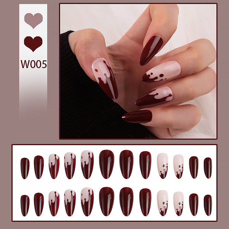 Kunstvolle Nagelspitzen mit Tropfen-Design Karnz