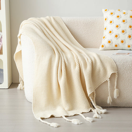 Strukturierte Strickwurfdecke