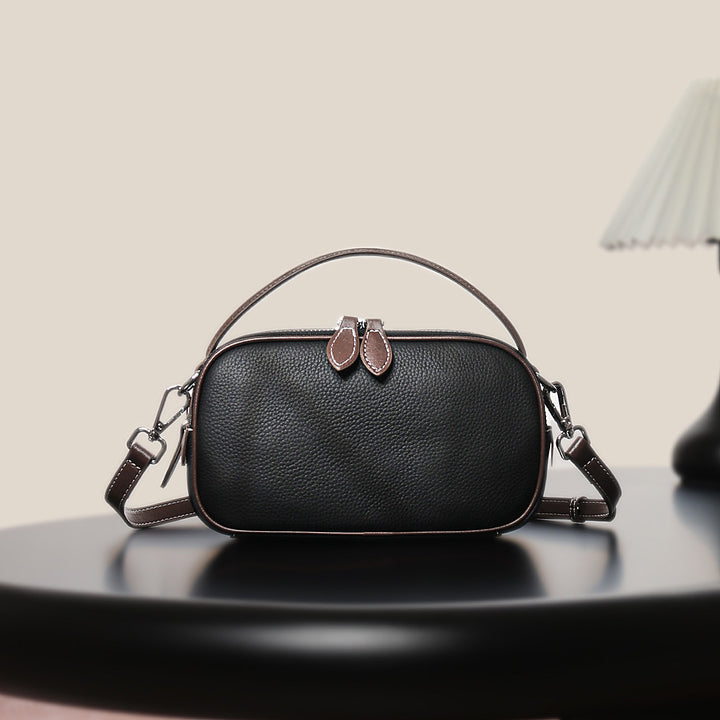 Strukturierte genarbte Leder-Top-Handle-Crossbody-Tasche mit abnehmbarem Riemen