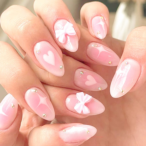 Dekorative Stiletto Press-On Nägel mit Schleifenakzent Karnz