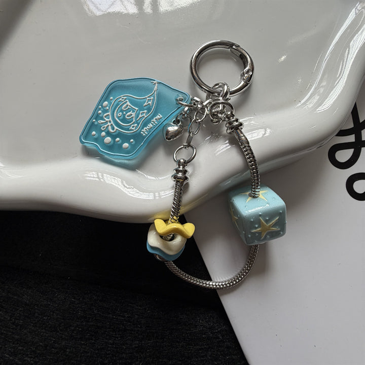 Dekorativer Charms Schlüsselanhänger Karnz 1790135471