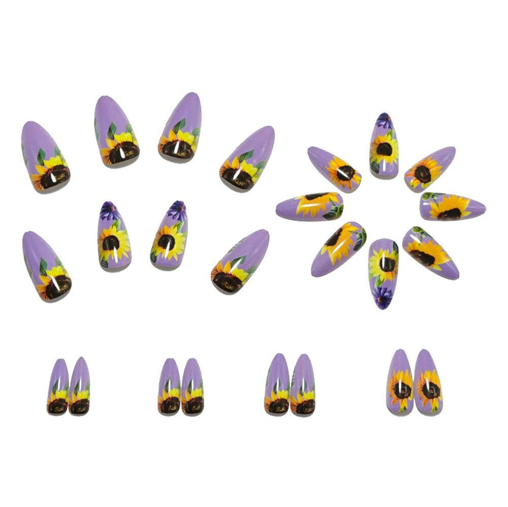 Kunstnägel mit aufwendigen Sonnenblumen-Motiven Karnz