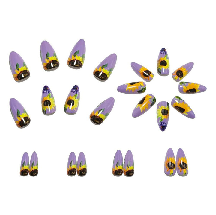 Kunstnägel mit aufwendigen Sonnenblumen-Motiven Karnz