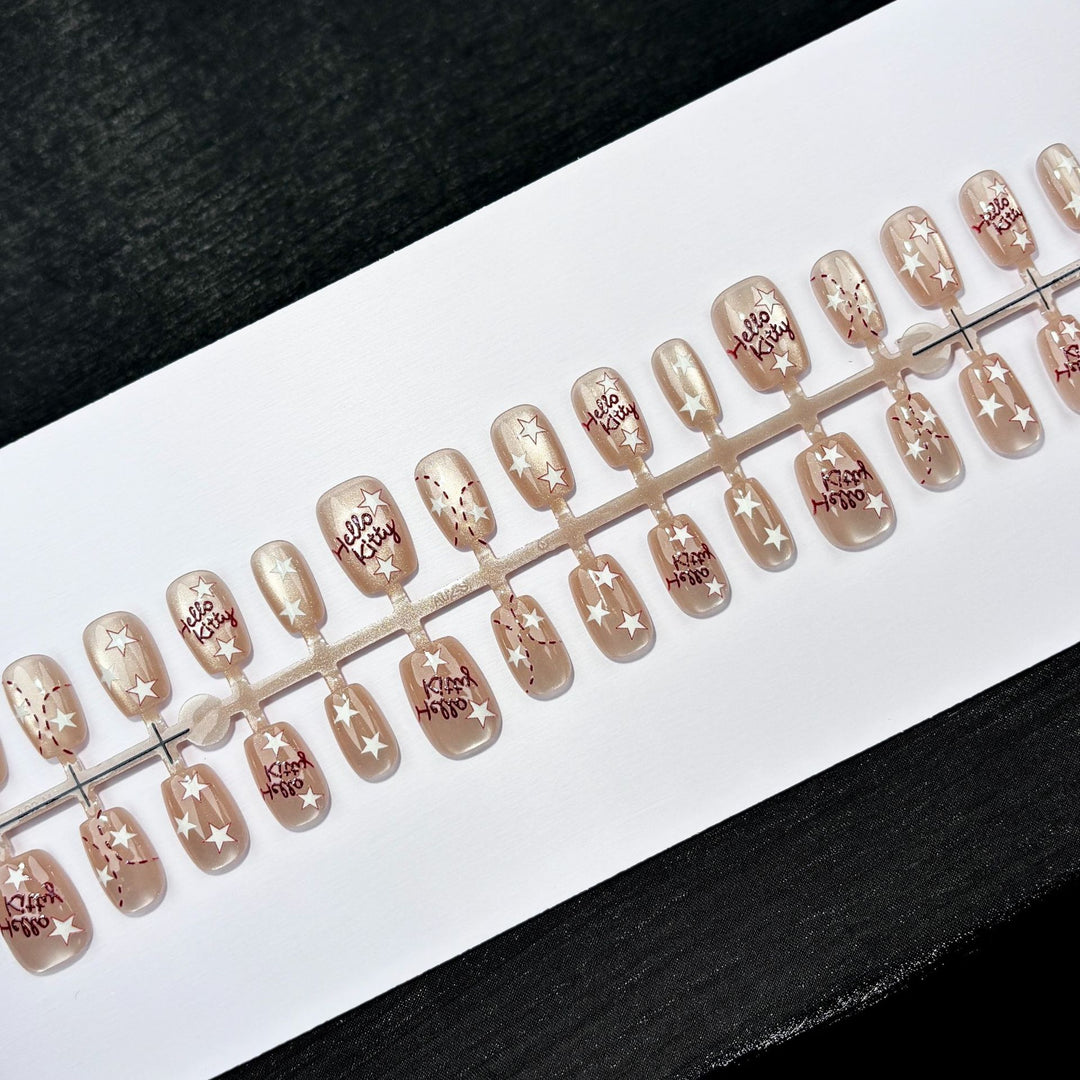 Dekoratives Press-On Nagelkunstset mit Stern Design