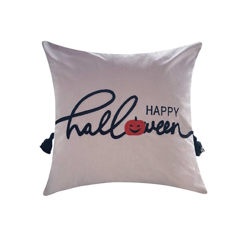 Quadratischer dekorativer Kissenbezug mit besticktem Happy‑Halloween‑Schriftzug, Kürbis‑Applikation und Quasten Karnz