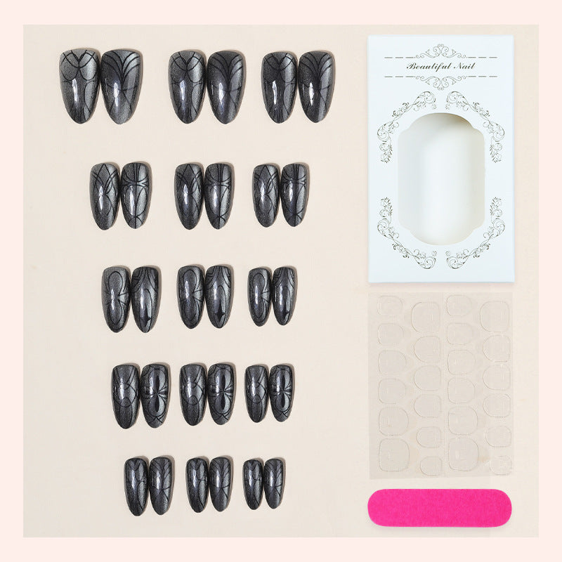 Dekorativer Presse-on-Nagelset mit künstlerischem Spinnendesign Karnz