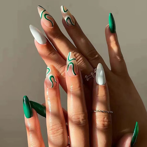 Künstlerische Stiletto Press-On Nägel mit Spiraldesign Karnz