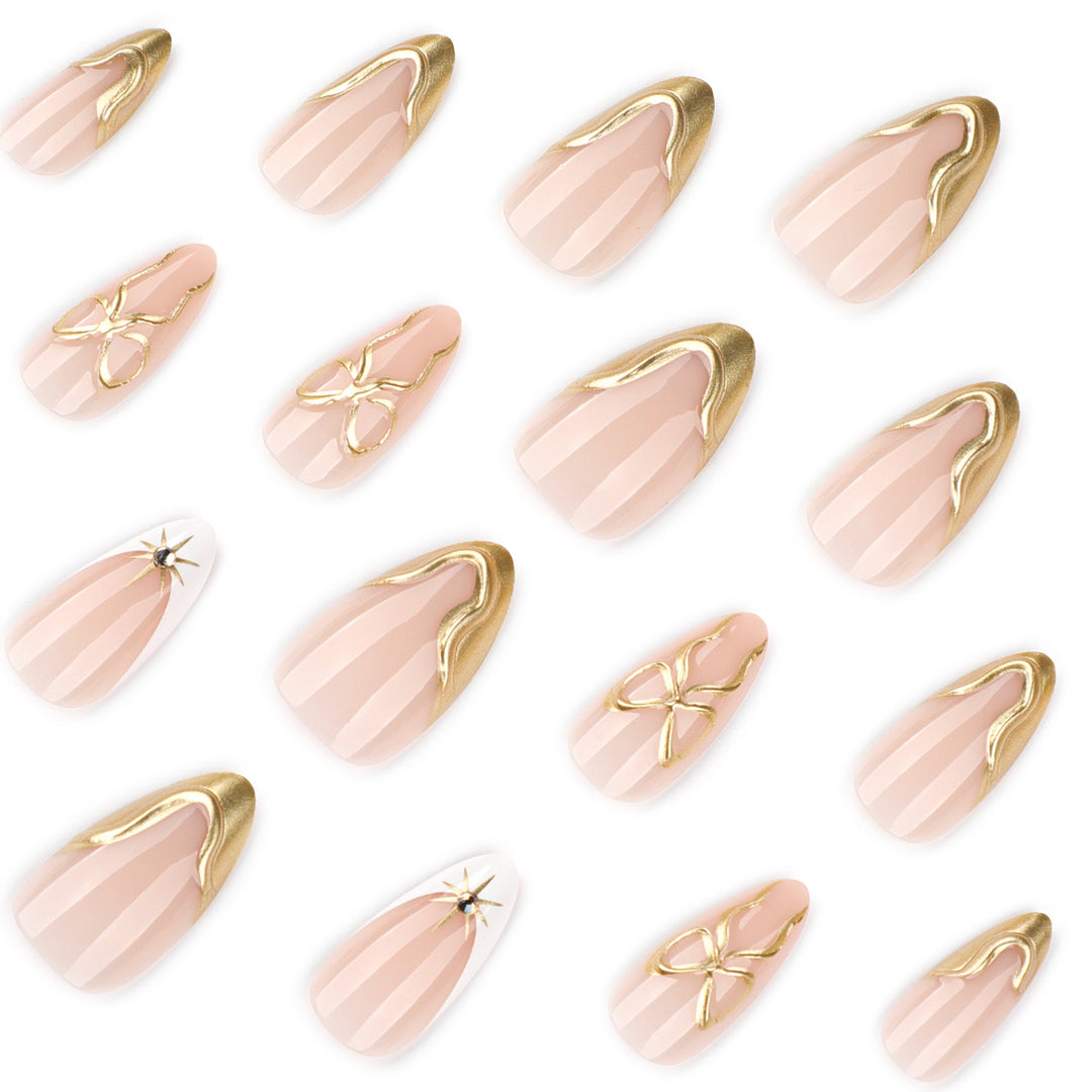 Kunstvolle Stiletto-Nägel mit eleganten Goldakzenten Karnz