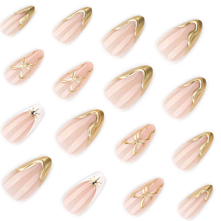 Kunstvolle Stiletto-Nägel mit eleganten Goldakzenten Karnz