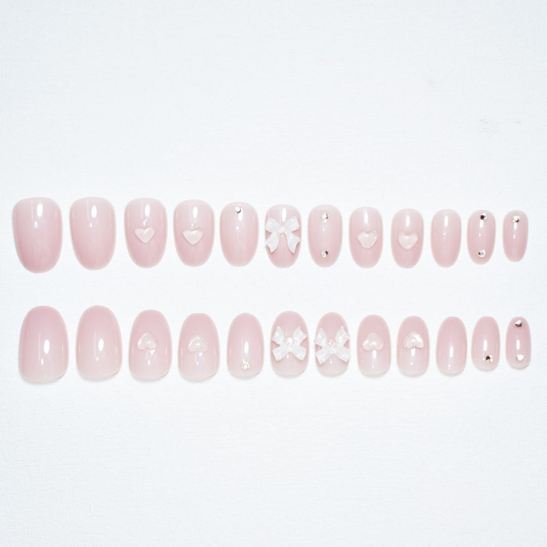 Künstlerisches Press-On Nagelset mit eleganten Schleifenakzenten Karnz