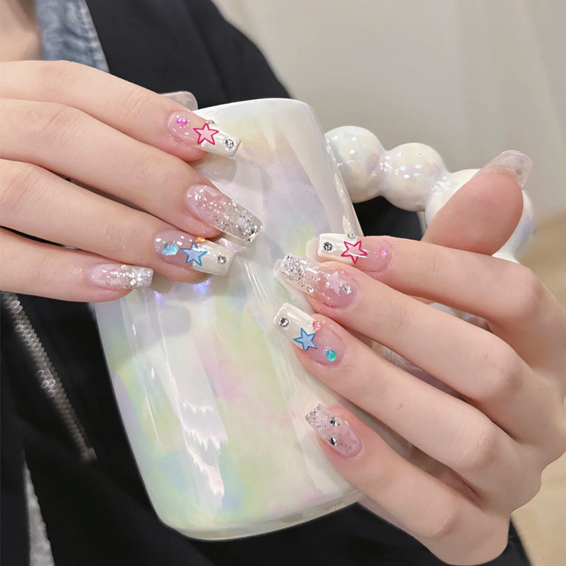 Glitzernde Kunstfingernägel mit Mond- und Sternmotiven Karnz