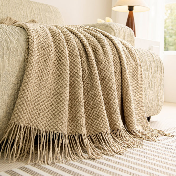 Strukturierte Strickwurfdecke