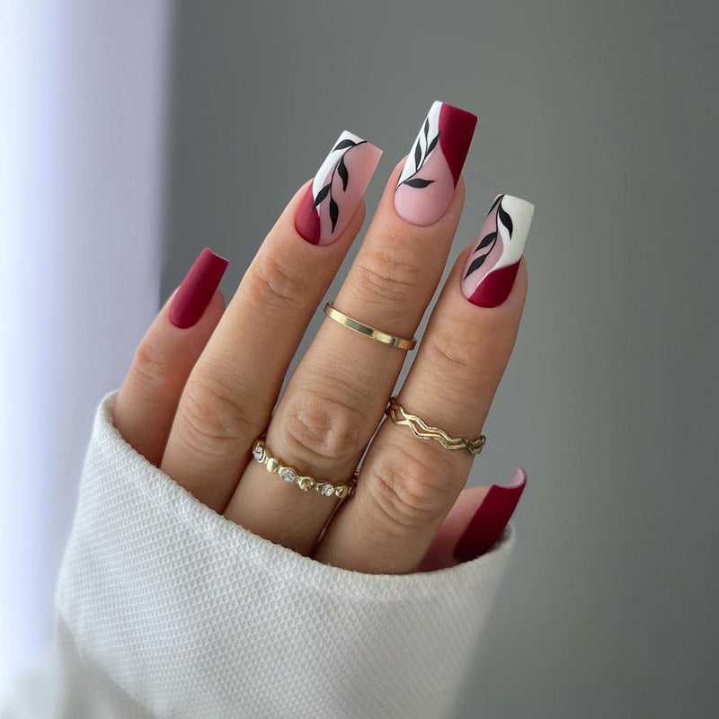 Elegante Stiletto Press-On Nagelkunst mit Strass-Akzenten Karnz