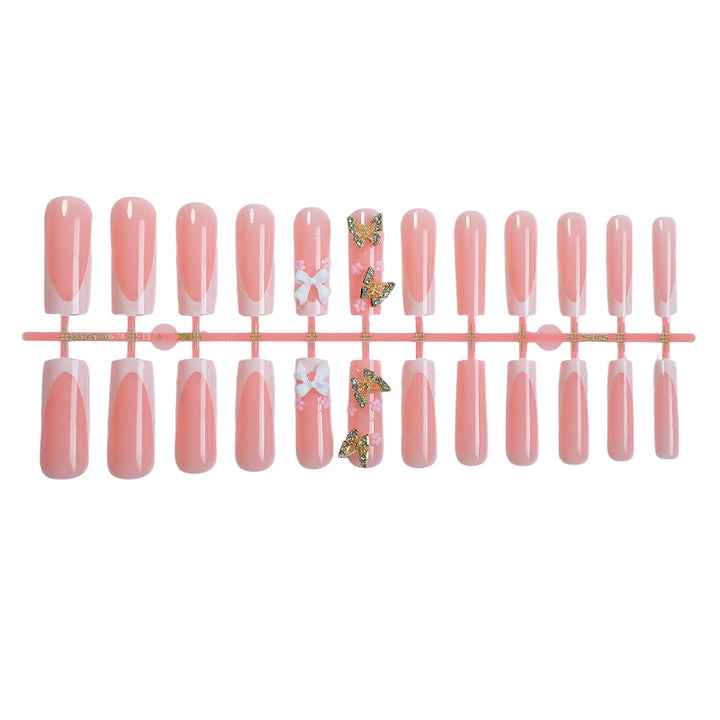 Dekoratives Press-On-Nagelset mit floralen und Schmetterlingsakzenten Karnz