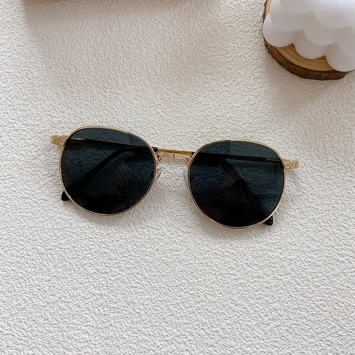 Modische Sonnenbrille mit Rundem Rahmen und Filigranem Design Karnz