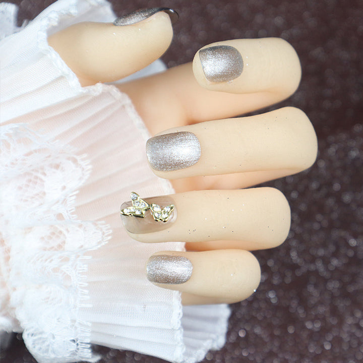 Glitzerndes Press-On-Nagelkunst-Set mit eleganten Schmetterlingsakzenten Karnz