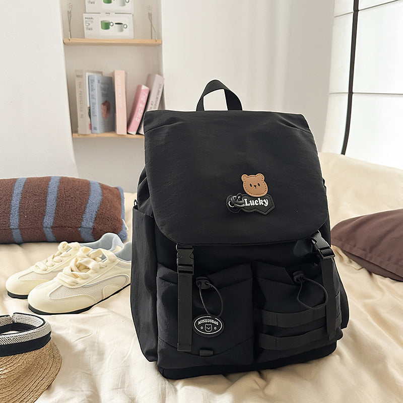 Verspielter Mehrfachtaschen-Rucksack für die Schule Karnz