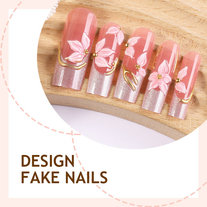 Elegantes Kunstnagelset mit floralen Designs und Glitzerakzenten Karnz