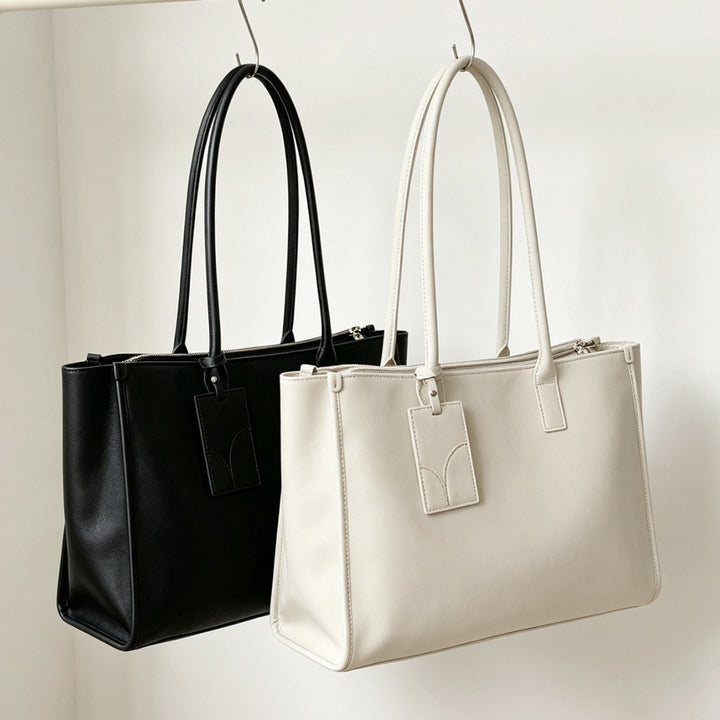 Glattes veganes Leder strukturiert Top-Zip Tote mit doppelten gerollten Griffen und Gepäckanhänger